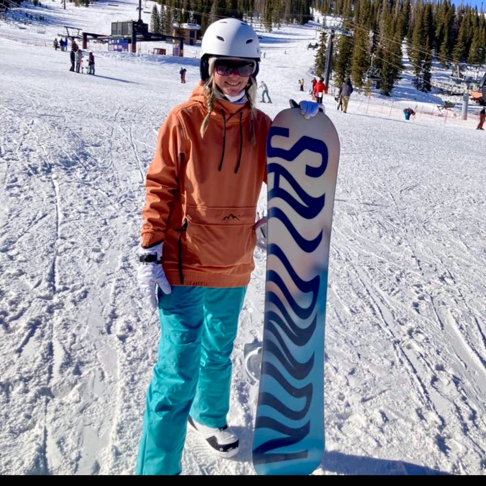 Woman’s salmon snowboard